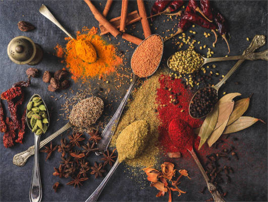 various spices on a table illustrating the differences between coaching and therapy